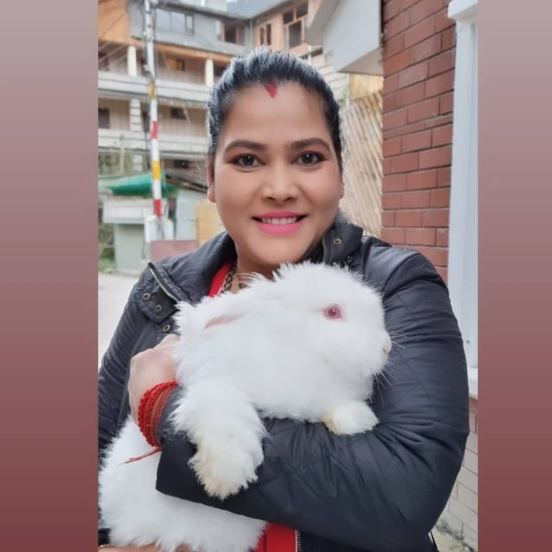 Seema Singh with a rabbit